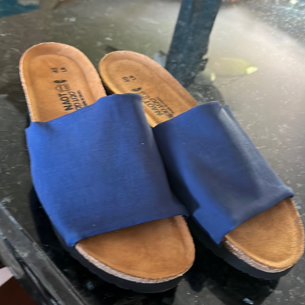 Naot blue slides like new worn once. Extremely high quality shoes.